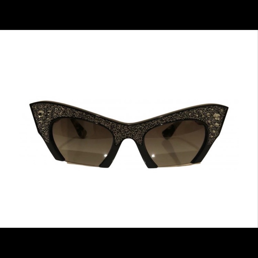 100% genuine Miu Miu sunglasses.